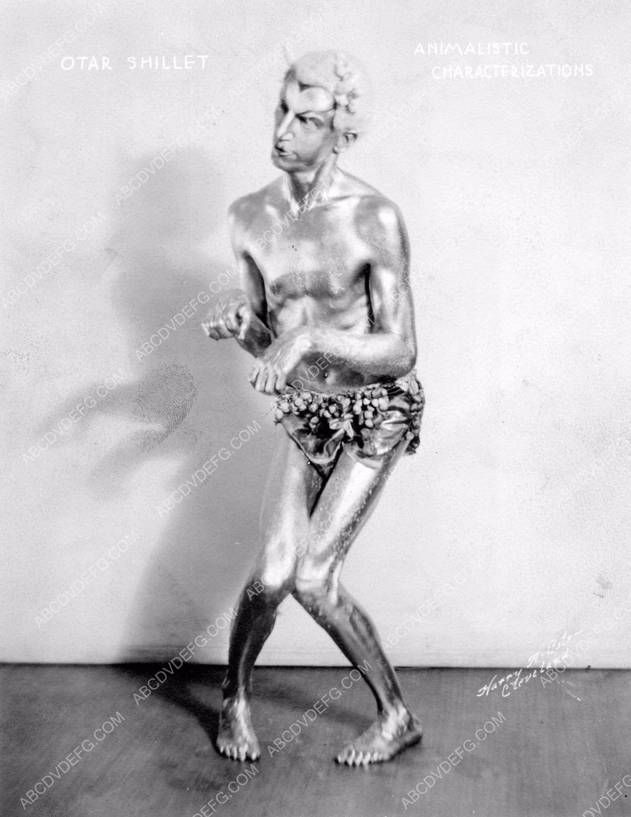 performance artist Otar Shillet painted in gold Animalistic Charcterizations 8b6-013